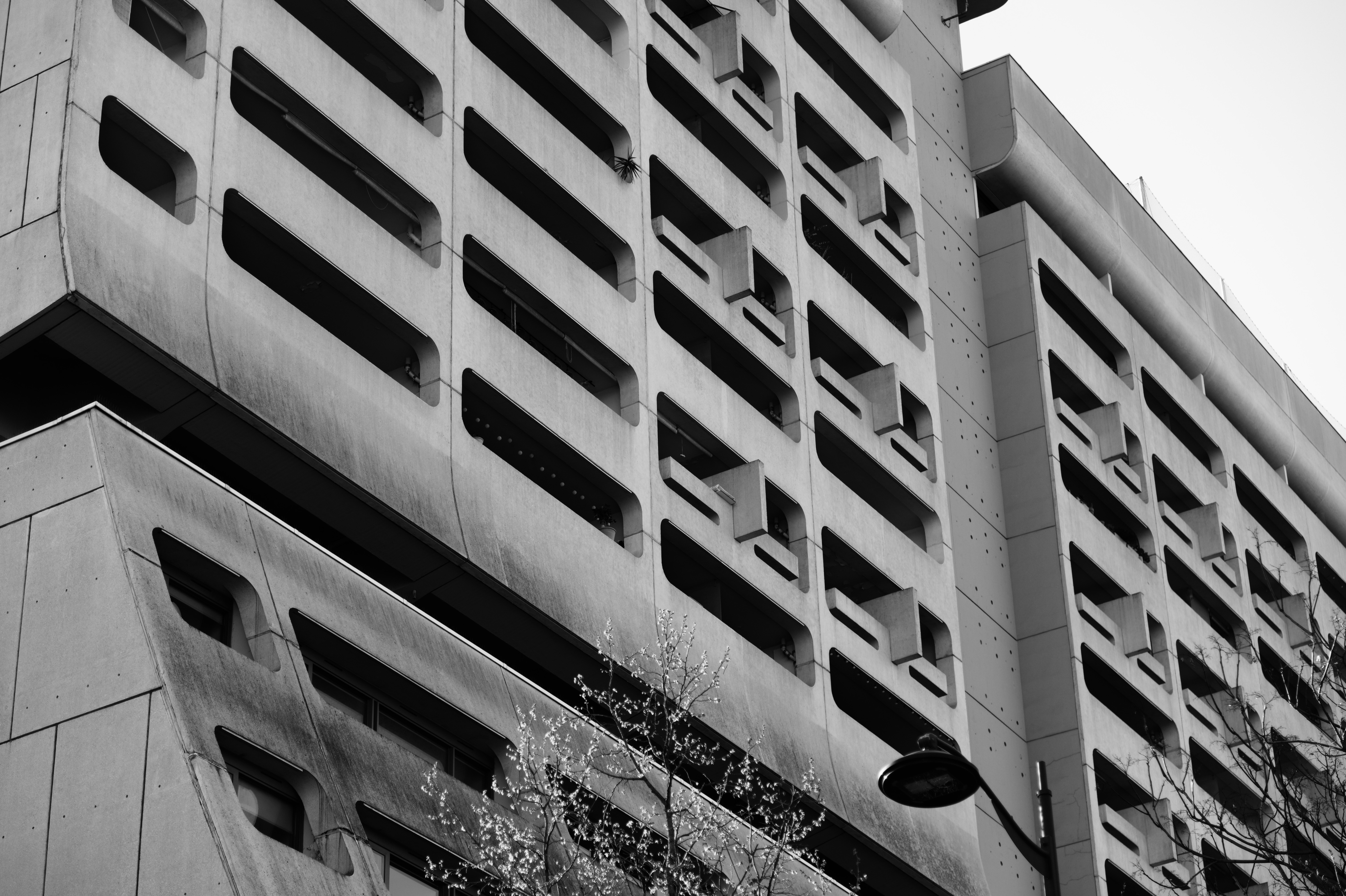 Facade with horizontal window slits and vertical structural ribs